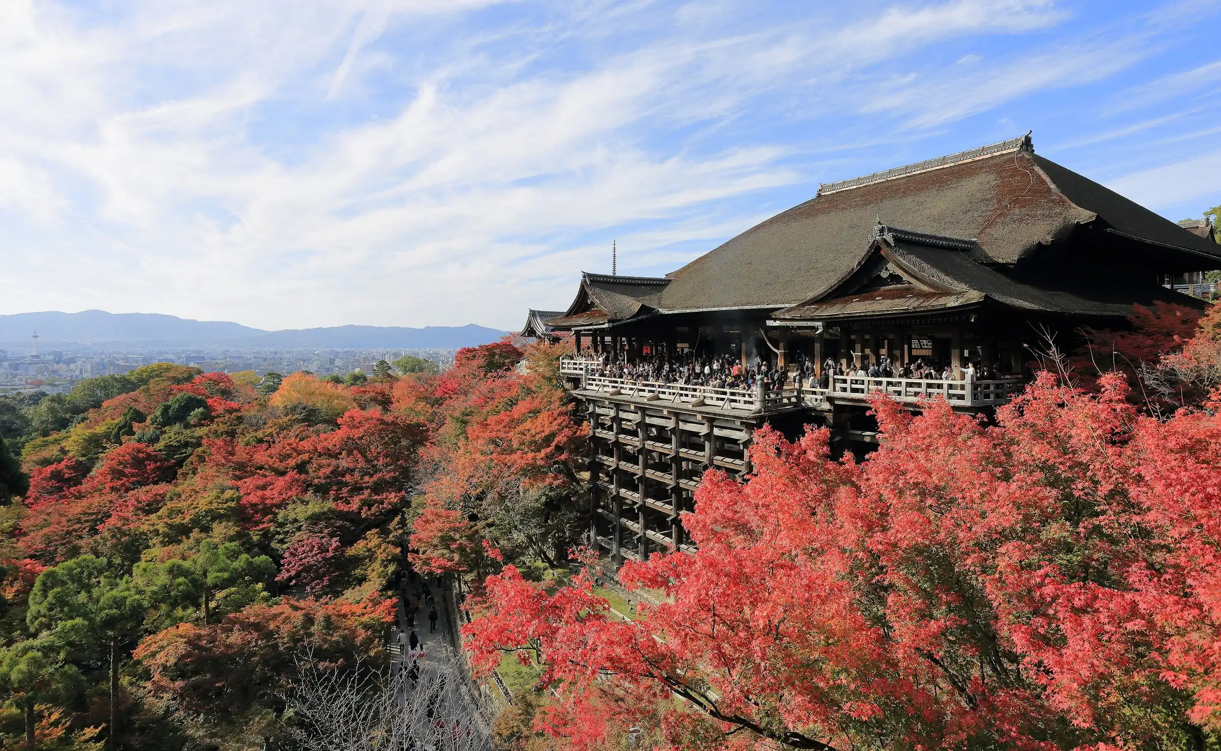 Kiyomizu-dera temple in Kyoto surrounded by red autumn leaves