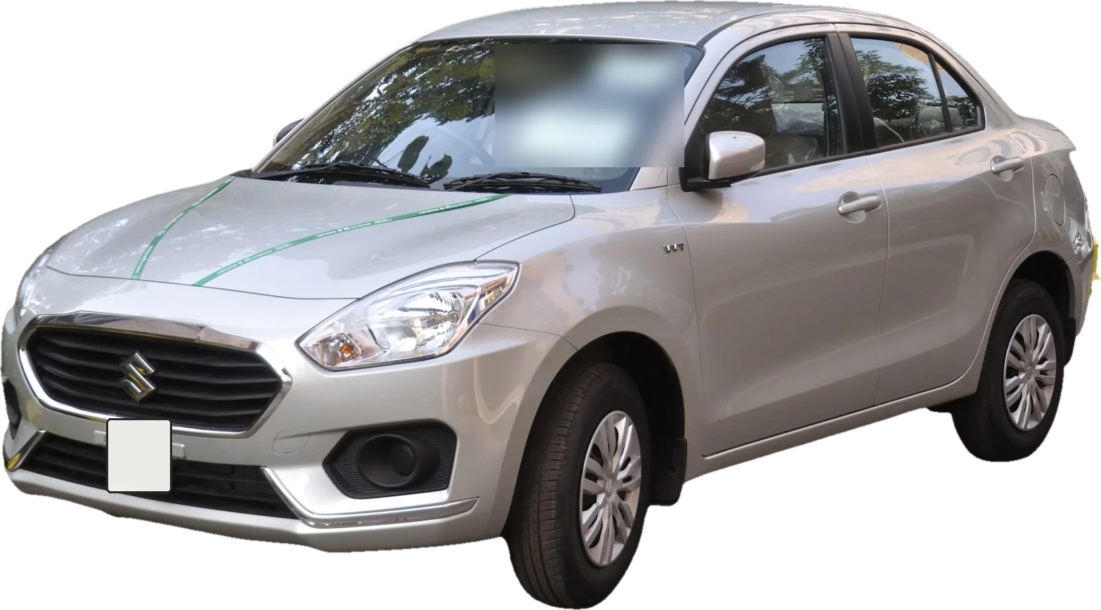 A silver Maruti Suzuki Dzire sedan, front three-quarter view