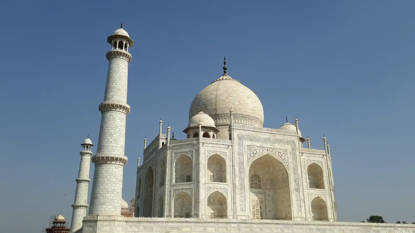 The Taj Mahal reflected in its long garden pool