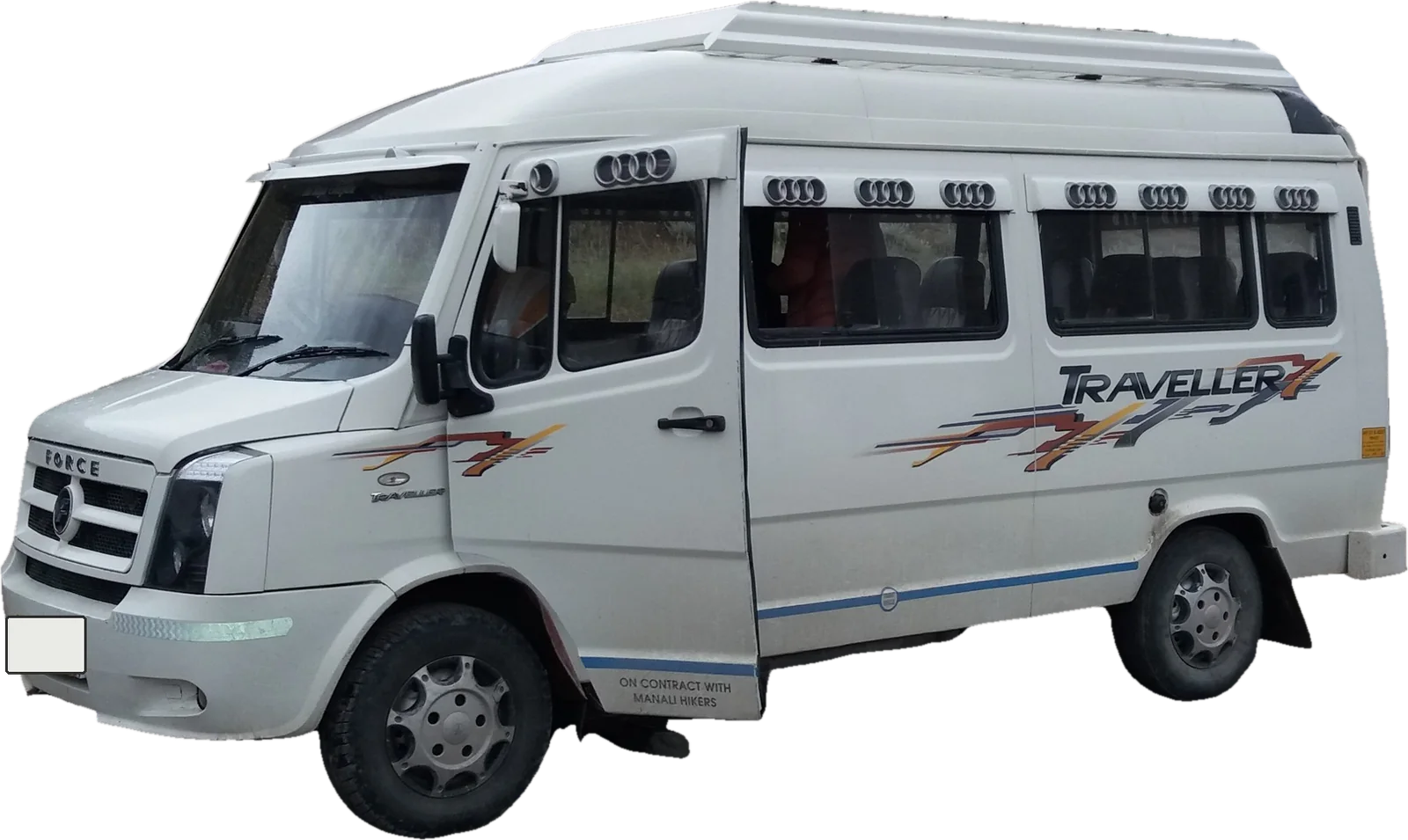 A white Force Tempo Traveller, front three-quarter view